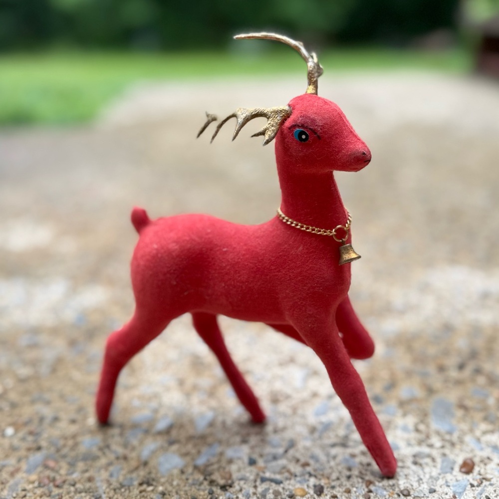 Vintage red flocked Christmas deer.